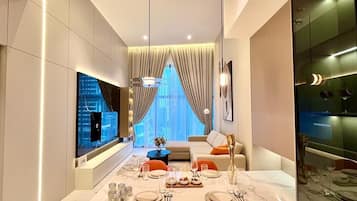 Premium Condo, 1 Bedroom, Kitchenette, City View | Living area