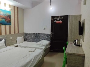 Habitación Confort con 1 cama matrimonial o 2 individuales, balcón, vista a la ciudad | Wifi gratis 