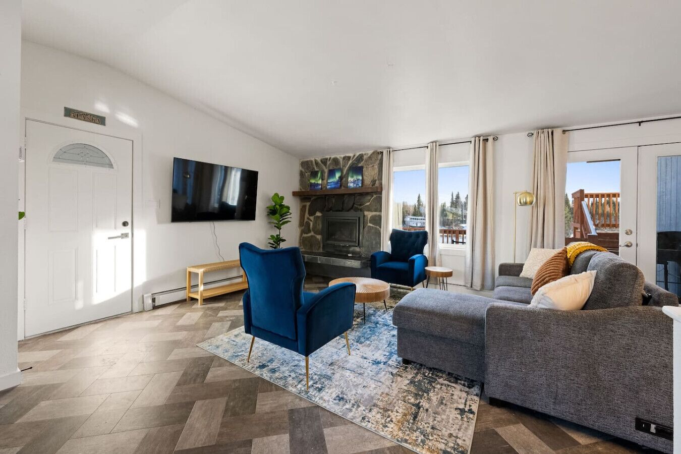 bright living room with big smart tv