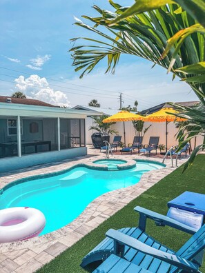 Outdoor pool, a heated pool - Sol Haven - Family Retreat • Pool & Spa • Pickleball • 10 min to AMI • Games (Bradenton)