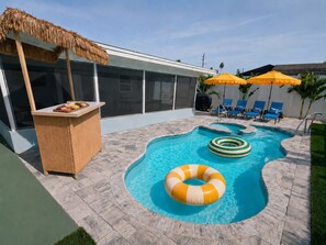 Outdoor pool, a heated pool - Sol Haven - Family Retreat • Pool & Spa • Pickleball • 10 min to AMI • Games (Bradenton)
