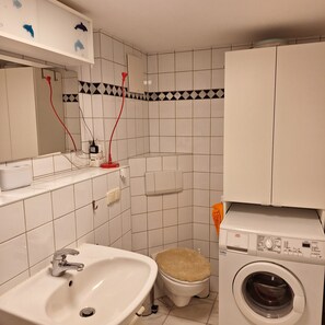 Hair dryer, towels, soap, toilet paper