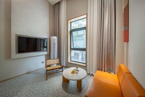 Yhden hengen comfort-huone | Oleskelualue
