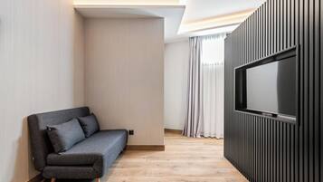 Superior Studio | Living area | 43-inch Smart TV with cable channels