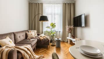 Family Apartment, Balcony, Courtyard View | Living area | Smart TV