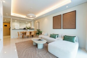 Deluxe Apartment, City View | Living area | 65-inch Smart TV with digital channels - Paramount Luxury 2BR-Burj Khalifa Views (Dubai)