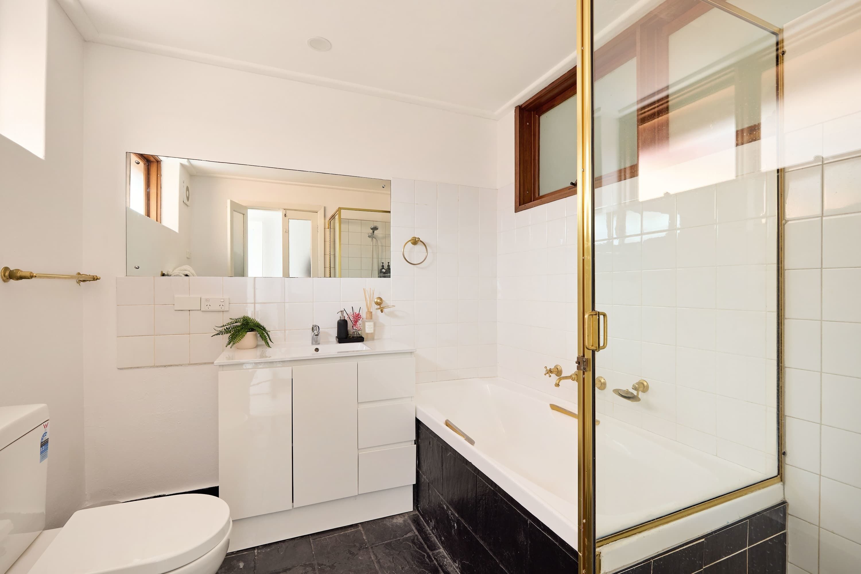Shower, hair dryer, towels, shampoo