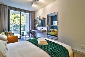 1 dormitorio, tabla de planchar con plancha, Internet y ropa de cama