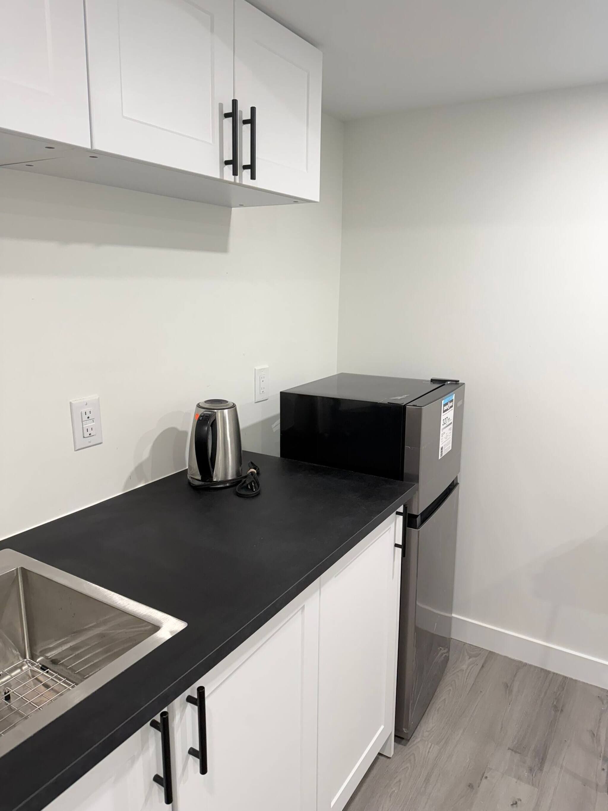 Fridge, high chair, cookware/dishes/utensils
