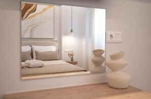 A modern bedroom with a bed, bedside table, lamp, and decorative vases. - Casa Doma Luxury Suite with Heated Mini Pool and Private Parking (Rethymno Town)