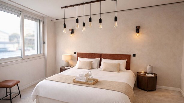 A modern bedroom with a large bed, bedside tables, a nightstand, a chair, and a window. - Art Loft # Design - Near Croisette | Beaches - A/C (Cannes)