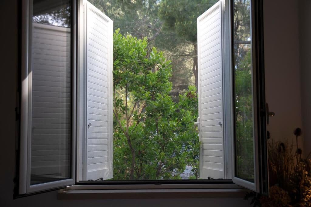Doppia Deluxe, bagno privato, vista giardino | Una cassaforte in camera, insonorizzazione, ferro/asse da stiro