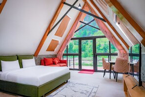 Deluxe Cottage, River View | Living area - Roameo Resorts (Sharda)