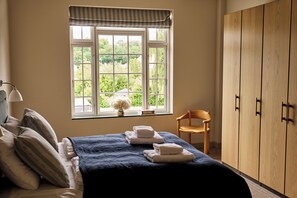 Suíte estúdio luxo | Wi-Fi de cortesia, roupa de cama