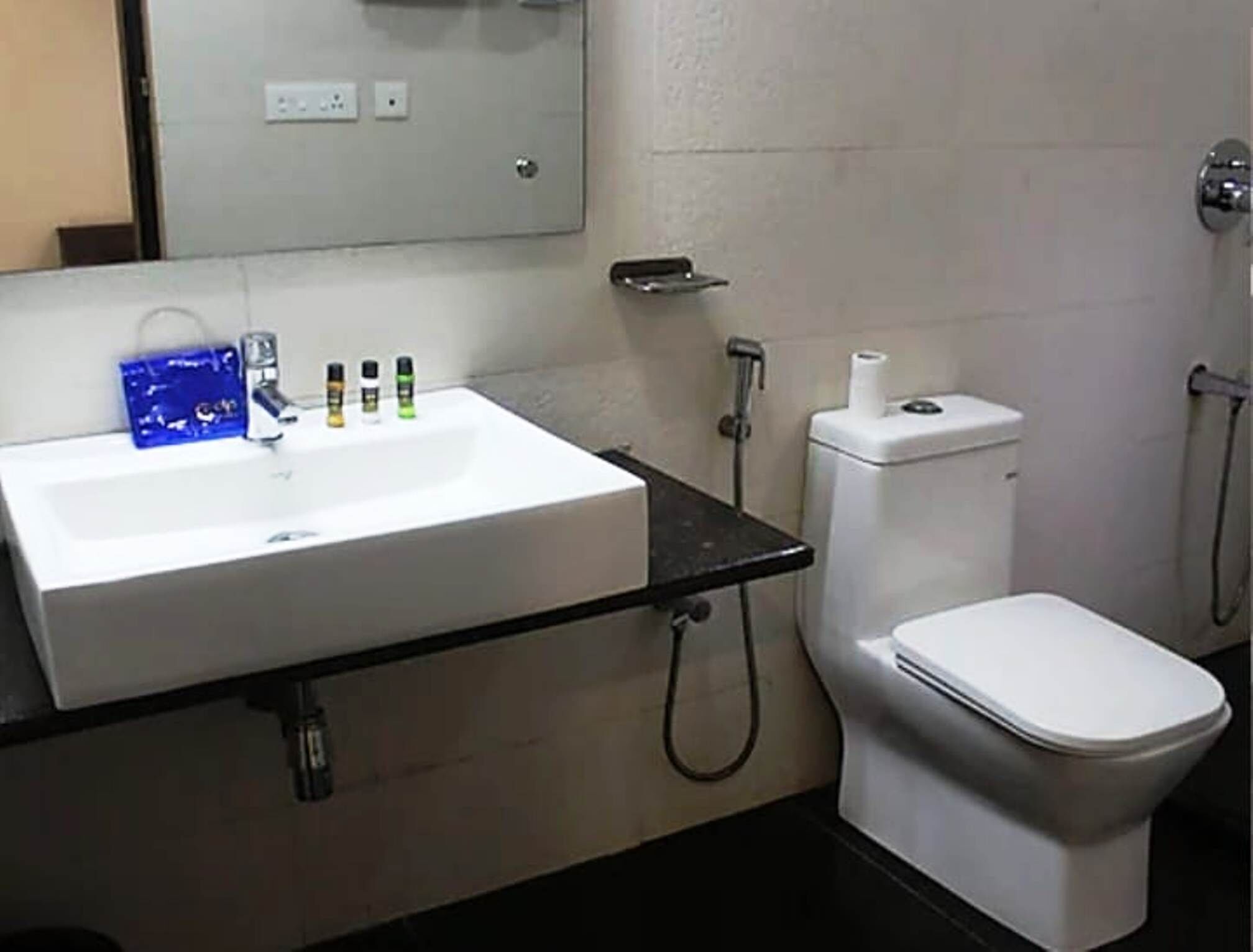 Luxury Room, Balcony, City View | Bathroom | Shower, free toiletries, slippers, towels