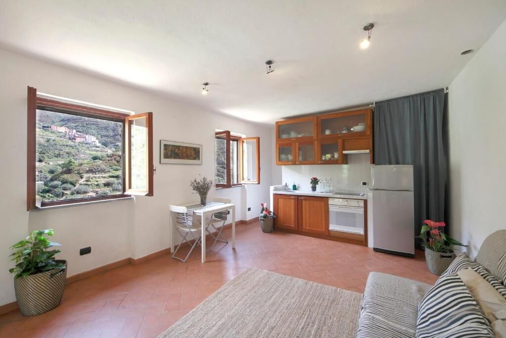 Casa superior, varanda, vista para a montanha | Parte interna