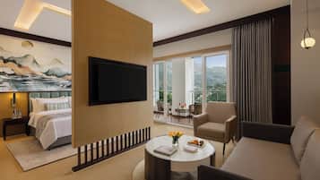 Suite, 1 Queen Bed (Lake View Suite) | Living area | 50-inch LED TV with satellite channels