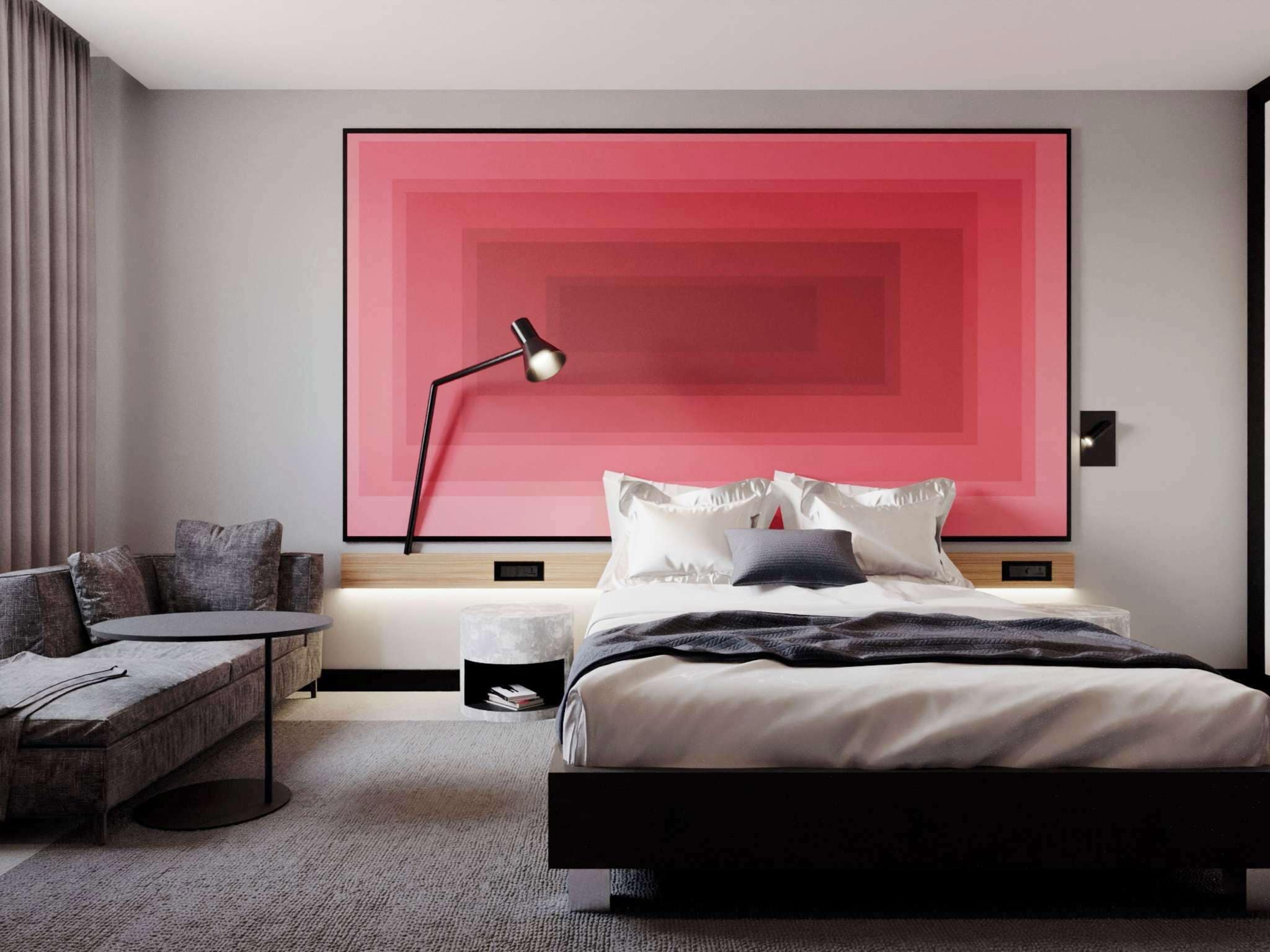 Un dormitorio moderno con una cama grande, una mesita de noche, una lámpara y una silla.