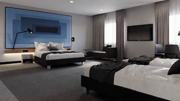 A modern hotel room with a large bed, a smaller bed, a desk, a chair, a TV, and a large abstract painting on the wall.
