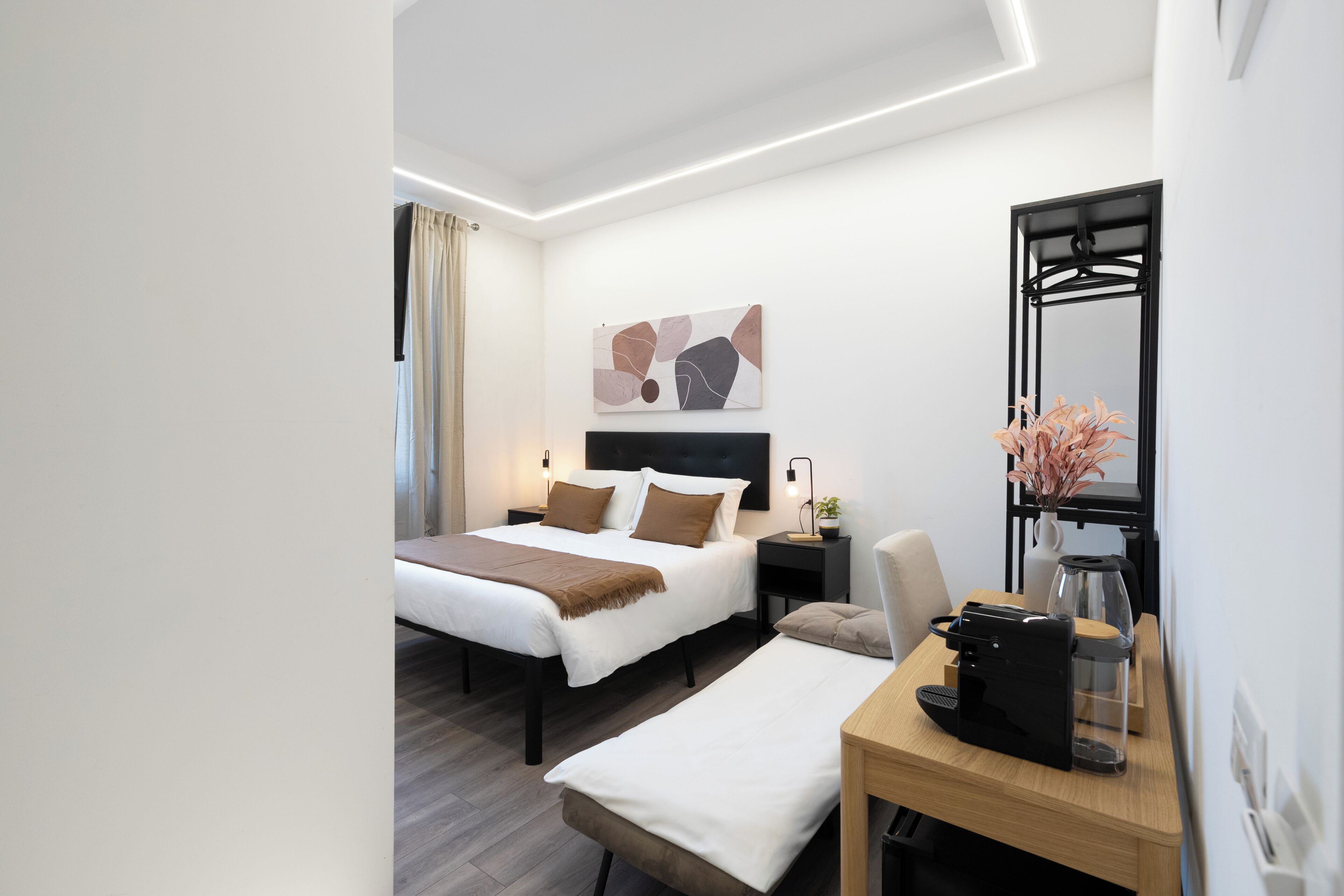 Hypo-allergenic bedding, desk, laptop workspace, free WiFi