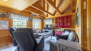 Cabin, 2 Bedrooms, Slope side | Living area | 50-inch Smart TV with cable channels, fireplace