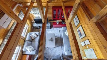 Cabin, 2 Bedrooms, Slope side | Living area | 50-inch Smart TV with cable channels, fireplace