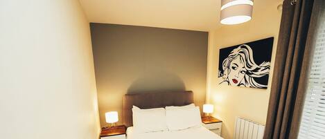 Appartement Deluxe, 2 chambres | Fer et planche Ă repasser, accĂšs au Wi-Fi (inclus), literie fournie