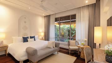 Villa Deluxe, vistas al jardín | Edredones de plumas y minibar (con algunos artículos gratuitos)