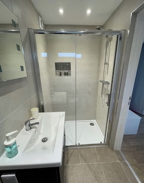 Hair dryer, towels, soap, shampoo