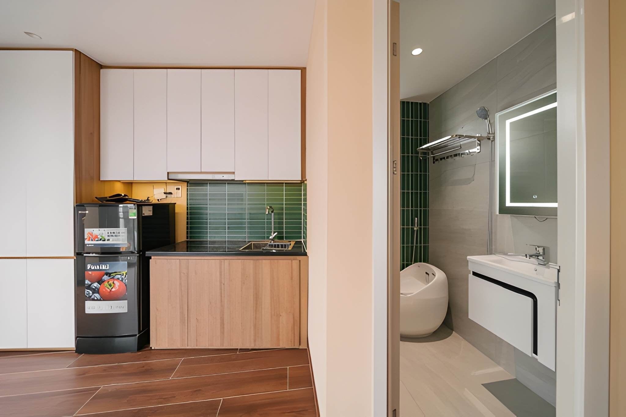 Suite, Balcony | Private kitchen
