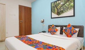Egyptian cotton sheets, premium bedding, in-room safe, free WiFi - Via Galaxy Hospitality (Pune)