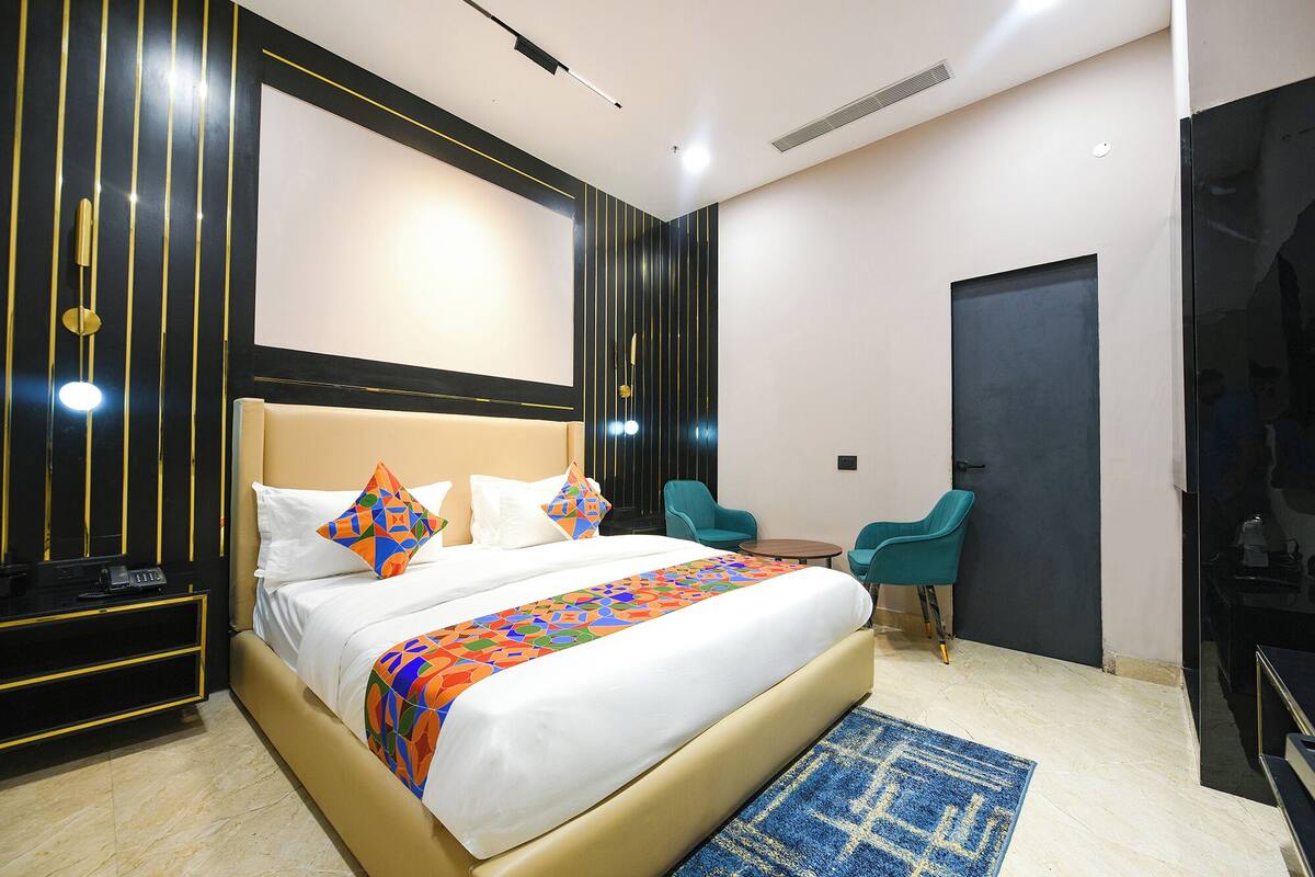 ห้องดีลักซ์ | ผ้าปูที่นอนฝ้ายอียิปต์, เครื่องนอนระดับพรีเมียม, ตู้นิรภัยในห้องพัก