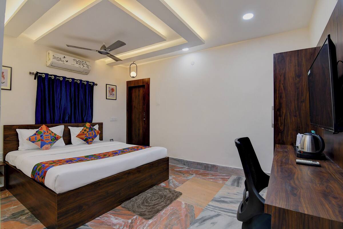 ห้องดีลักซ์ | ผ้าปูที่นอนฝ้ายอียิปต์, เครื่องนอนระดับพรีเมียม, ตู้นิรภัยในห้องพัก
