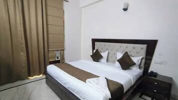 Suite | Lakens van Egyptisch katoen, luxe beddengoed, een kluis op de kamer
