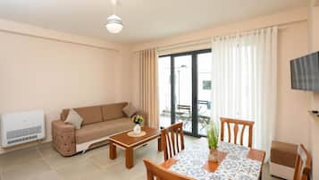 Appartamento Standard, balcone, vista mare | Area soggiorno