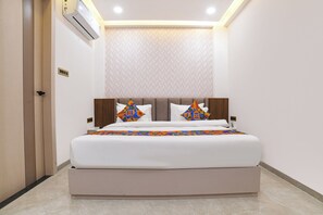 Premium Room | Egyptian cotton sheets, premium bedding, free WiFi, bed sheets - Fabhotel Raj Villa I (Indore)
