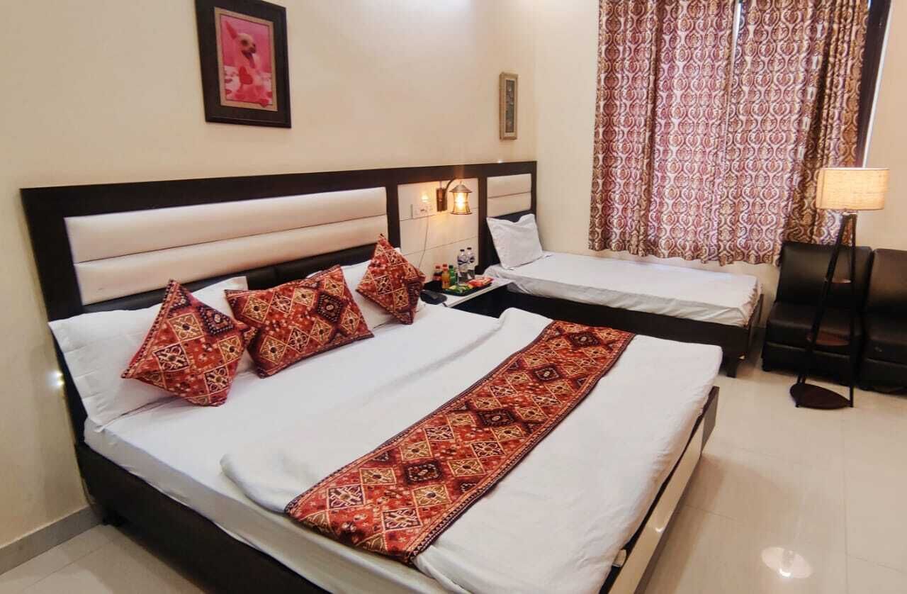 Deluxe Triple Room, Air conditioning | View from room