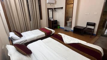 Family Triple Room, Balcony, Mountain View | Blackout curtains, iron/ironing board, free WiFi