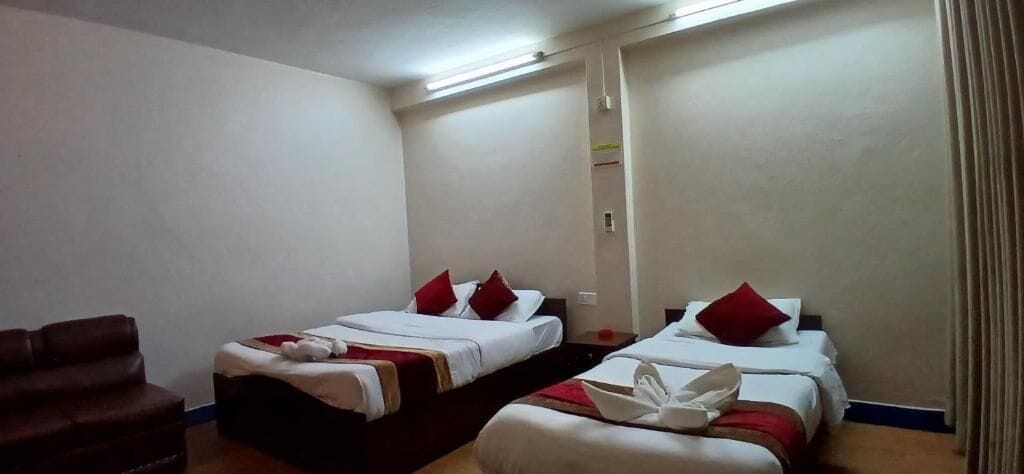 Standard Twin Room | Blackout drapes, iron/ironing board, free WiFi