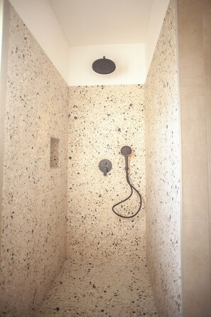 Shower, hair dryer, towels, toilet paper