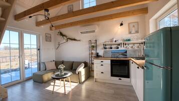 Family Chalet, Garden View | Laptop workspace, blackout drapes, iron/ironing board, free WiFi