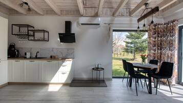 Comfort Chalet, Garden View | Private kitchen | Full-sized fridge, oven, stovetop, dishwasher