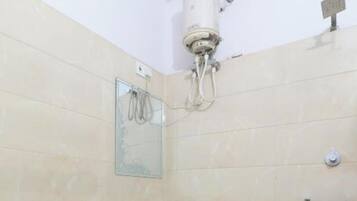 Shower, rainfall showerhead, slippers, towels