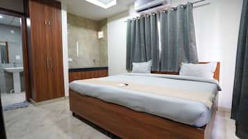 Deluxe Room, Balcony, City View | Desk, laptop workspace, free WiFi