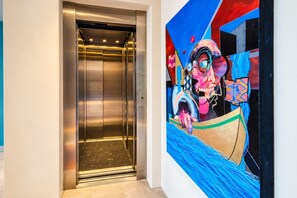 A private elevator makes moving between floors easier, serving every level except level 1, where the blue king bedroom is located. - Unique Designer Gem: Private Pool, Elevator, Views (Puerto Vallarta)
