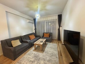 Apartment, Balkon, Stadtblick | Wohnbereich
