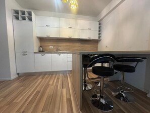 Appartement, balcon, vue ville | Cuisine privée