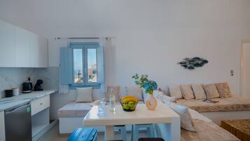 Luxury Cycladic Residence with Private Balcony, Upper Floor | Living area