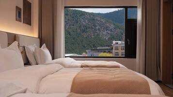 Signature Suite | Premium bedding, down duvets, minibar, individually furnished
