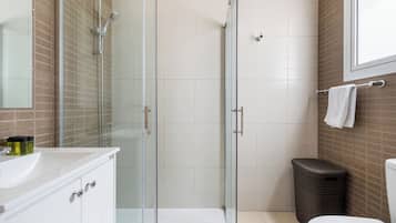 Apartment, Balcony, City View | Bathroom | Shower, free toiletries, hair dryer, slippers